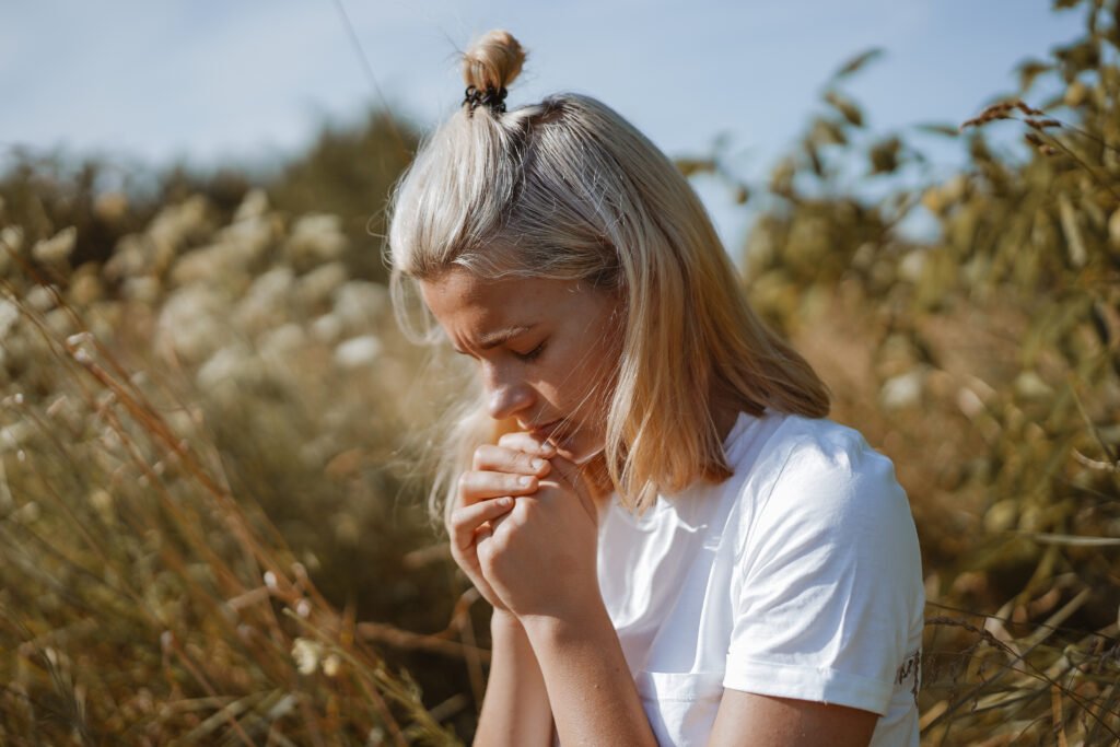 Hands folded in prayer faith